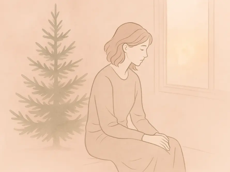 Mujer sosteniendo una luz cálida; ternura e introspección. culpa femenina Navidad